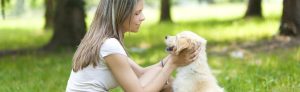 girl with dog outside